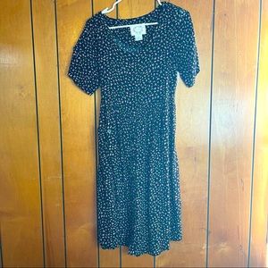 Super cute Erika foot black and floral dress size medium ties in back